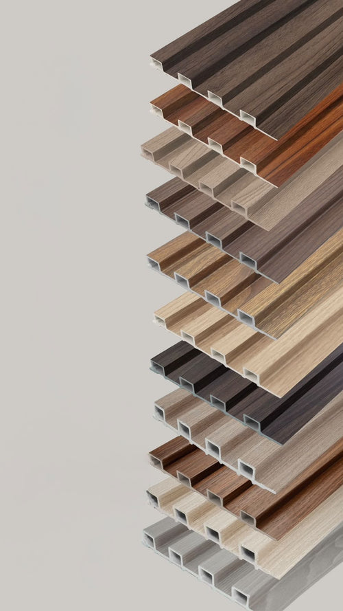 Assorted collection of decorative ribbed wall panels in various wood textures and colors.